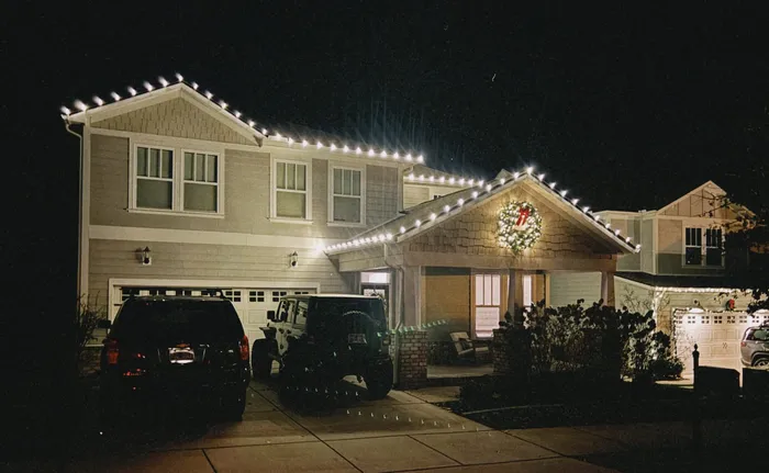 Professional Christmas light installation on a home's gables and entryway, Williamson County, TN