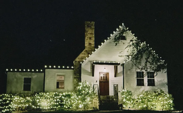Professional Christmas light installation on a home's gables and entryway, Williamson County, TN